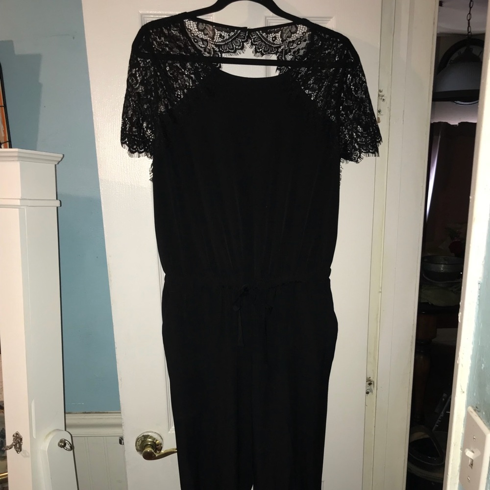 Lace shoulder, backless jump suit.